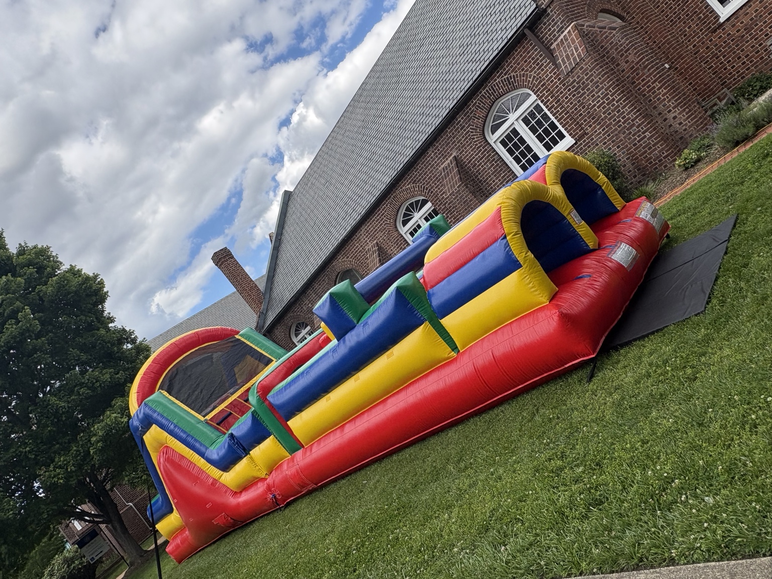 Inflatable obstacle course setup for a church community event